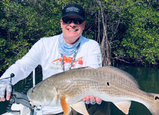 Ultimate Catch Host, Space Coast Daily Outdoor Editor Capt. Eric Ciocher Reels in Monster 33-Inch Redfish