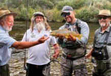 ‘We need to talk’: fly-fishing program provides a hook for mental health