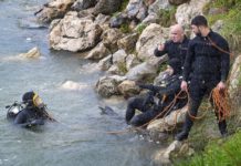 Dive squad searches the Manawatū River for missing fisherman