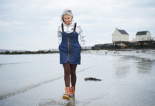 The SoPo Designer Modeling Fashion on Fishing Waders