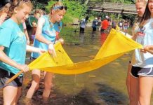 Trout raised by River Bend students released into state park waters | Education