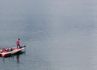 Diehard fishermen testing waters despite difficult conditions